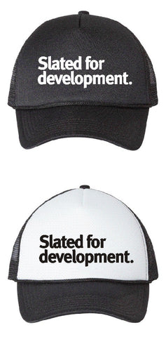 Slated for Development Trucker Cap by Grubwear